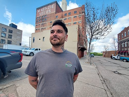 Neo Nutes Market owner Cody Ray stands outside the McKenzie Seeds building in downtown Brandon, where he plans to reopen his urban farm in 2025. (Abiola Odutola/The Brandon Sun)