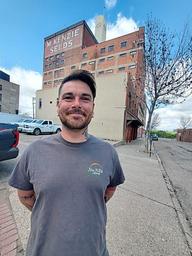 Neo Nutes Market owner Cody Ray stands outside the McKenzie Seeds building in downtown Brandon, where he plans to reopen his urban farm in 2025. (Abiola Odutola/The Brandon Sun)