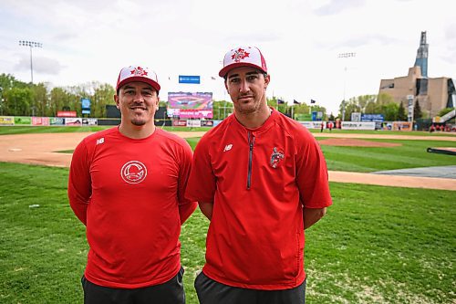 Mike Sudoma/Free Press
Manager Logan Watkins (left) and Pitcher Zac Reningen after batting practice prior to Wednesday evenings game against the Chicago Dogs 
May 22, 2024