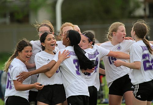 The Vincent Massey Vikings girls celebrate their Brandon High School Soccer League championship after beating the Crocus Plainsmen 3-1 in extra time at Massey on Thursday. See Page B1 for the game story. (Thomas Friesen/The Brandon Sun) 