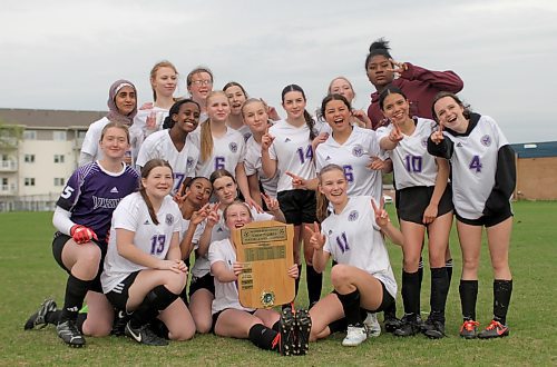 The Vincent Massey Vikings girls celebrate their Brandon High School Soccer League championship after beating the Crocus Plainsmen 3-1 in extra time at Massey on Thursday. (Thomas Friesen/The Brandon Sun) 