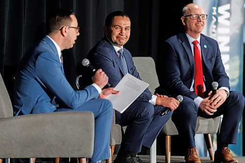 MIKE DEAL / FREE PRESS
Manitoba Premier Wab Kinew (centre) and Winnipeg Mayor Scott Gillingham (right) joined Ryan Kuffner (left), President &amp; CEO at Economic Development Winnipeg during the start of the EDW&#x2019;s AGM, Thursday morning.
240523 - Thursday, May 23, 2024.