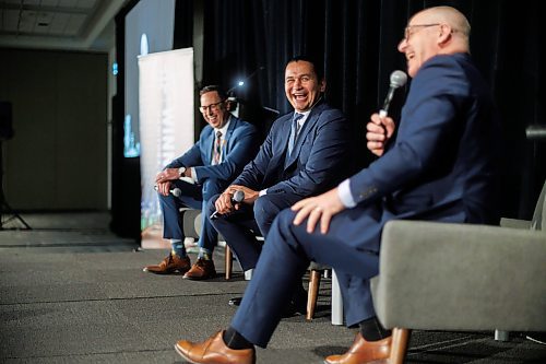 MIKE DEAL / FREE PRESS
Manitoba Premier Wab Kinew (centre) and Winnipeg Mayor Scott Gillingham (right) joined Ryan Kuffner (left), President &amp; CEO at Economic Development Winnipeg during the start of the EDW&#x2019;s AGM, Thursday morning.
240523 - Thursday, May 23, 2024.