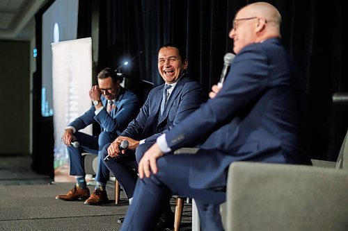 MIKE DEAL / FREE PRESS
Manitoba Premier Wab Kinew (centre) and Winnipeg Mayor Scott Gillingham (right) joined Ryan Kuffner (left), President &amp; CEO at Economic Development Winnipeg during the start of the EDW&#x2019;s AGM, Thursday morning.
240523 - Thursday, May 23, 2024.