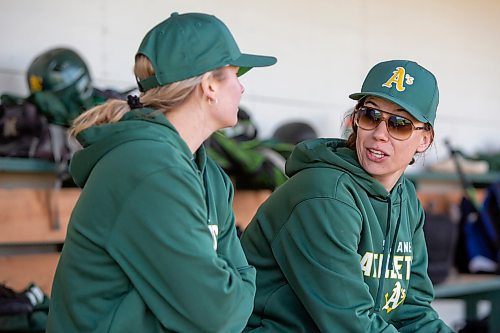 BROOK JONES / FREE PRESS
St. James A's (Yellow - female team) bench coach Katie Heppner (right) and first base coach Jamey Johnson are pictured chatting while in the dugout during the team's home game against the St. James A's (Green) in Winnipeg Minor Baseball League 15U AA action at St. James Optimist Fields in Winnipeg, Man., Wednesday, May 22, 2024. The St. James A's (Yellow  - female team) earned their first win of the 2024 season after earning a 6-2 vicrtory over the St. James A's (Green).
