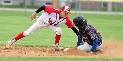 Boissevain Centennials shortstop Drew Hilhorst tags out Wawanesa Brewers third baseman Avery Kirkup on a steal attempt. Later in the game, Kirkup would hit a homer facing Hilhorst on the mound. Boissevain prevailed 6-4 during Wawanesa's South West Baseball League season opener. (Jules Xavier/The Brandon Sun)