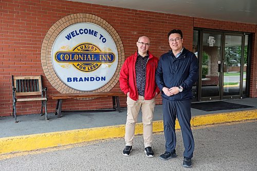 24052024
Supervising Manager Alexey Volosnikov and Co-Owner Leo Ho outside the Colonial Inn, recently purchased by Ho, on Thursday.
(Tim Smith/The Brandon Sun)