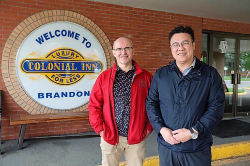 24052024
Supervising Manager Alexey Volosnikov and Co-Owner Leo Ho outside the Colonial Inn, recently purchased by Ho, on Thursday.
(Tim Smith/The Brandon Sun)