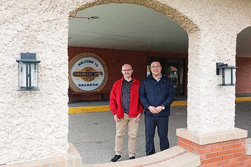 24052024
Supervising Manager Alexey Volosnikov and Co-Owner Leo Ho outside the Colonial Inn, recently purchased by Ho, on Thursday.
(Tim Smith/The Brandon Sun)