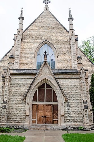 BROOK JONES / FREE PRESS
Holy Trinity Church at 256 Smith St. in Winnipeg, Man., that was built in 1983-84 as a long cruciform-shaped stone structure is pictured Friday, May 24, 2024. The church parish has request permission of the Diocese of Rupter's Land to sell the Victoria-era Gothic Revial architecturally designed church.