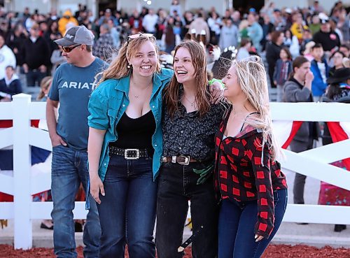 JASON HALSTEAD / FREE PRESS
Grooms for Race 1 winner Yola celebrate on the opening day of live thoroughbred racing on May 20, 2024 at Assiniboia Downs.