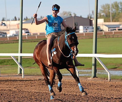 JASON HALSTEAD / FREE PRESS
Rider Joseph Jackson of team In It to Win It celebrates winning a race during Manito Ahbee Indian Horse Relay Race action on May 20, 2024 at Assiniboia Downs.