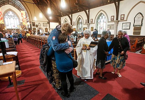 JOHN WOODS / FREE PRESS
Rev. Helen Holbrook greets parishioners after a service at Holy Trinity Anglican Church Sunday, May 26, 2024. The church’s foundation is crumbling and the parish is looking for a buyer to help them rebuild it.

