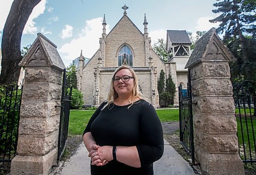 JOHN WOODS / FREE PRESS
Sandra Bender, peoples warden and music ministry coordinator, is photographed outside Holy Trinity Anglican Church Sunday, May 26, 2024. The church’s foundation is crumbling and the parish is looking for a buyer to help them rebuild it.

