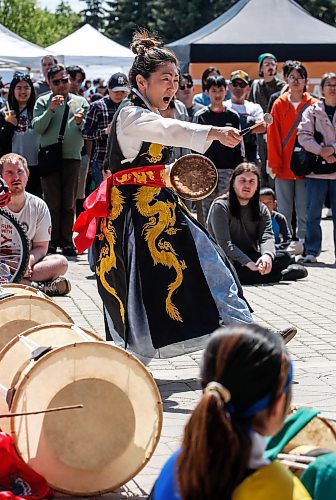 JOHN WOODS / FREE PRESS
Enjoo Jung, director of Red Lotus Korean dance group and other musicians perform during Taste of Asia at the Forks Sunday, May 26, 2024. 

Reporter: standup