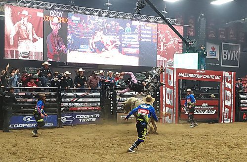 Cody Coverchuk gets off Emerald Inn after riding the big bull for eight seconds during the first round of the PBR Chute Out at Westman Place on Saturday evening in front of an enthusiastic sold-out crowd. (Perry Bergson/The Brandon Sun)
May 25, 2024