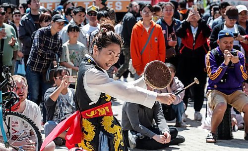 JOHN WOODS / FREE PRESS
Enjoo Jung, director of Red Lotus Korean dance group and other musicians perform during Taste of Asia at the Forks Sunday, May 26, 2024. 

Reporter: standup