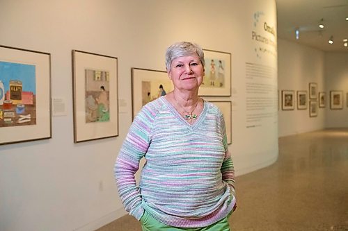 xBROOK JONES / FREE PRESS
Darlene Coward Wight who is the WAG-Qaumajuq Curator of Inuit Art is pictured in front of the Omalluq: Pictures from my Life exhibit which features work by Kinngait artist Omalluq Oshutsiaq. Oshutsiaq began drawing during the last two years of her life and died in 2014.. The art exhibit runs until March 30, 2025.