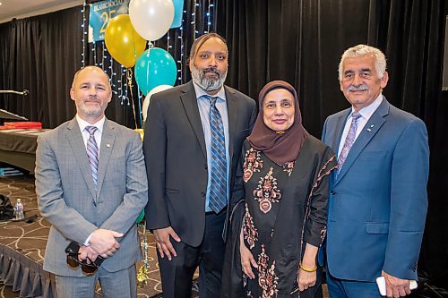 BROOK JONES / FREE PRESS
Winnipegger Shahina Siddiqui (second from far right), who created the Islamic Social Service Association is pictured with emcee Krishna Lalbiharie (second from far left), award receipient Shawn Feely and ISSA chair Abdo El Tassi (far right) at the ISSA's 25th Anniversary Fundraising Gala Dinner which was hosted at the Hilton Suites in Winnipeg,Man., Thursday, May 23, 2024. The event honoured the advocacy works of 10 community builders, including Uzoma Asagwara, Jennifer Chen, Shawn Feely, Leah Gazan, Harun Kibirige, Dr. Andrew McLean, Diane Redsky, Haroon Siddigui, Ramsey Zeid and the Winnipeg Foundation.
