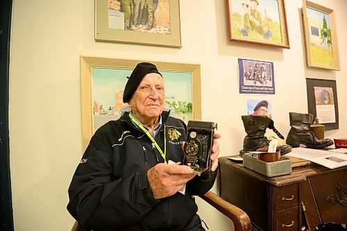 Mike Sudoma/Free Press
World War 2 veteran and collector Len Van Roon posing with a. Camera he had purchased in England during his time in the Canadian Forces
May 24, 2024