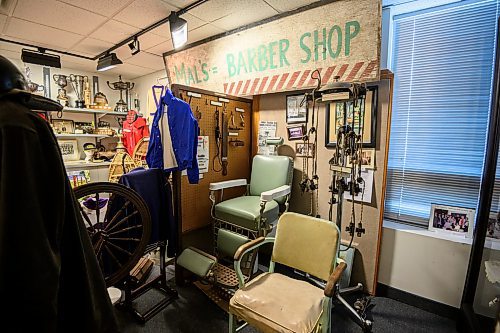 Mike Sudoma/Free Press
Barbershop equipment and a sign from Mals Barber Shop on display inside the Charleswood Museum Saturday
May 24, 2024