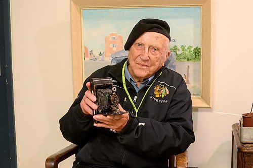 Mike Sudoma/Free Press
World War 2 veteran and collector Len Van Roon posing with a. Camera he had purchased in England during his time in the Canadian Forces
May 24, 2024