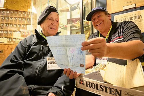Mike Sudoma/Free Press
WW2 vet Len Van Roon Sr (left) and his son Len Van Roon Jr (right) share laughs as they look at letters Van Roon Sr wrote to his wife during the Second World War.
May 24, 2024