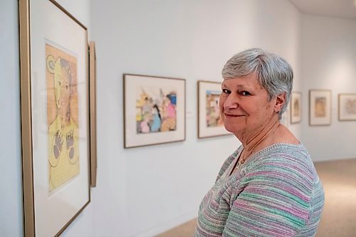 BROOK JONES / FREE PRESS
Darlene Coward Wight who is the Winnipeg Art Gallery-Qaumajuq Curator of Inuit Art is pictured standing near Untitled (Shaman's Transformation, 2013), which is included in the Omalluq: Pictures from my Life exhibit and features work by Kinngait artist Omalluq Oshutsiaq at the WAG-Qaumajuq in Winnipeg, Man., Friday, May 24, 2024. This particular piece of artwork was done with graphite, coloured pencil and a felt-tip pen on paper. Oshutsiaq began drawing during the last two years of her life and died in 2014.. The art exhibit runs until March 30, 2025.