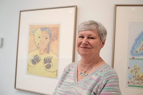 BROOK JONES / FREE PRESS
Darlene Coward Wight who is the Winnipeg Art Gallery-Qaumajuq Curator of Inuit Art is pictured standing next to Untitled (Shaman's Transformation, 2013), which is included in the Omalluq: Pictures from my Life exhibit and features work by Kinngait artist Omalluq Oshutsiaq at the WAG-Qaumajuq in Winnipeg, Man., Friday, May 24, 2024. This particular piece of artwork was done with graphite, coloured pencil and a felt-tip pen on paper. Oshutsiaq began drawing during the last two years of her life and died in 2014.. The art exhibit runs until March 30, 2025.