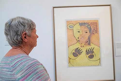 BROOK JONES / FREE PRESS
Darlene Coward Wight who is the Winnipeg Art Gallery-Qaumajuq Curator of Inuit Art is pictured looking at Untitled (Shaman's Transformation, 2013), which is included in the Omalluq: Pictures from my Life exhibit and features work by Kinngait artist Omalluq Oshutsiaq at the WAG-Qaumajuq in Winnipeg, Man., Friday, May 24, 2024. This particular piece of artwork was done with graphite, coloured pencil and a felt-tip pen on paper. Oshutsiaq began drawing during the last two years of her life and died in 2014.. The art exhibit runs until March 30, 2025.