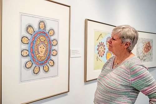 BROOK JONES / FREE PRESS
Darlene Coward Wight who is the Winnipeg Art Gallery-Qaumajuq Curator of Inuit Art is pictured looking at the Omalluq: Pictures from my Life exhibit which features work by Kinngait artist Omalluq Oshutsiaq at the WAG-Qaumajuq in Winnipeg, Man., Friday, May 24, 2024. Oshutsiaq began drawing during the last two years of her life and died in 2014. The art exhibit runs until March 30, 2025.