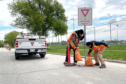 Ruth Bonneville / Free Press

Local - Road work

2024 construction season starts.

Photo of City of Wpg. public works personal setting up barricades on Tyndall Ave. for sidewalk construction.  


May 27th, 2024
