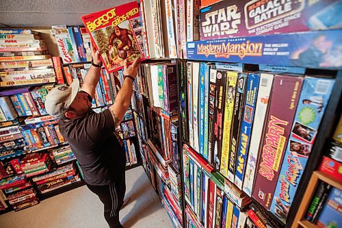 JOHN WOODS / FREE PRESS
Matthew Bencharski&#x2019;s game collection, which consists of games from the 60&#x2019;s and on, is photographed in his basement Monday, May 27, 2024. 

Reporter: dave