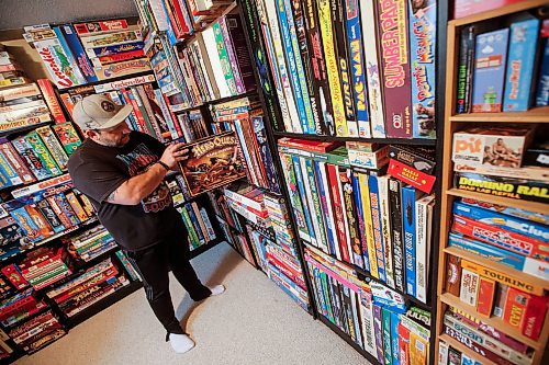 JOHN WOODS / FREE PRESS
Matthew Bencharski&#x2019;s game collection, which consists of games from the 60&#x2019;s and on, is photographed in his basement Monday, May 27, 2024. 

Reporter: dave