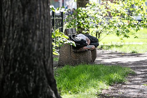 JOHN WOODS / FREE PRESS
A person sleeps on a bench outside Holy Trinity church in downtown Winnipeg Tuesday, May 28, 2024. Allegedly downtown churches are facing security challenges.

Reporter: john