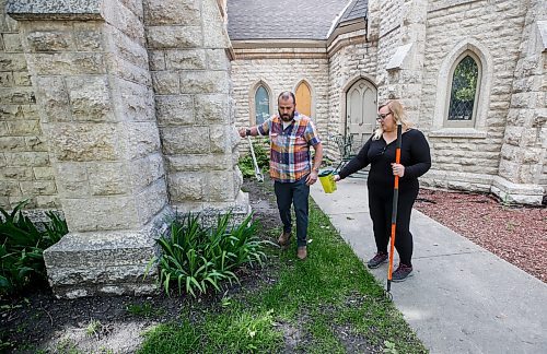 JOHN WOODS / FREE PRESS
Michael Minor, rector&#x2019;s warden, and Sandra Bender, people&#x2019;s warden, search for used needles outside Holy Trinity church in downtown Winnipeg Tuesday, May 28, 2024. Allegedly downtown churches are facing security challenges.

Reporter: john