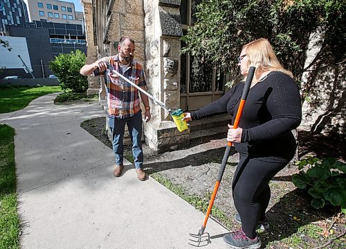 JOHN WOODS / FREE PRESS
Michael Minor, rector&#x2019;s warden, and Sandra Bender, people&#x2019;s warden, search for used needles outside Holy Trinity church in downtown Winnipeg Tuesday, May 28, 2024. Allegedly downtown churches are facing security challenges.

Reporter: john