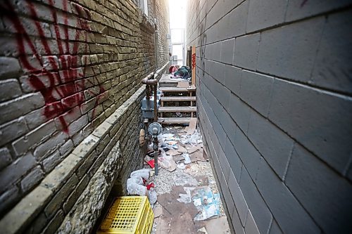 JOHN WOODS / FREE PRESS
The alley which acts as a sleeping place for homeless people next to The Meeting Place church, right, in downtown Winnipeg Tuesday, May 28, 2024. Allegedly downtown churches are facing security challenges.

Reporter: john