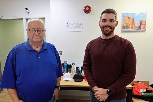 Carberry Signs Brandon print division manager Tom Wenham (left) and co-owner Mike Fedak inside the former Brandon Sun building. (Abiola Odutola/The Brandon Sun)