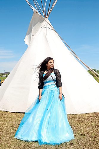 Graduate Brytanna Linklater of École Secondaire Neelin High School poses for photos at the Riverbank Discovery Centre on Wednesday. (Tim Smith/The Brandon Sun)