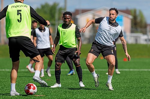 MIKE DEAL / FREE PRESS
Valour FC Raphael Ohin (left) and Jordan Swibel (right) during practice at the Ralph Cantafio Soccer Complex Wednesday.
240529 - Wednesday, May 29, 2024.