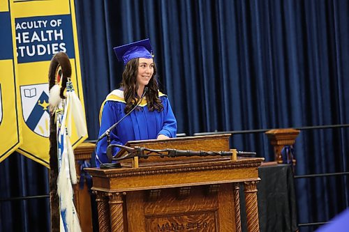 Julie Van Den Bussche, who graduated with an honours bachelor of science degree and a major in psychology, expresses her excitement and gratitude during her valedictory speech. (Abiola Odutola/The Brandon Sun)