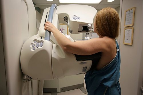 A national task force that provides guidance for primary health-care providers is not lowering the recommended breast cancer screening age to 40, despite pressure from several cancer specialists, surgeons and radiologists. A woman gets a mammogram at the University of Michigan Cancer Center in Ann Arbor, Mich. in a May 22, 2015 file photo. THE CANADIAN PRESS/AP-Kimberly P. Mitchell/Detroit Free Press via AP