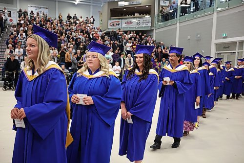 Graduates enter the BU Health Living Centre for Brandon University’s convocation for the faculty of education on Thursday. (Tim Smith/The Brandon Sun)