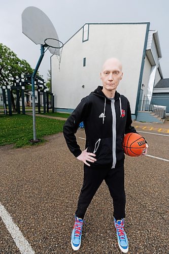 MIKE DEAL / FREE PRESS
Jeff Kovalik-Plouffe at the Lord Roberts Community Centre outdoor courts where he spent a lot of time during his youth.
U of W assistant basketball coach Jeff Kovalik-Plouffe is a walking medical miracle. Since 2003, the 41-year-old Winnipeg has endured ulcerative colitis, a bout of encephalitis , a liver transplant and most recently, a diagnosis of stage 3 colon cancer, just as the Wesmen were preparing for their first game at the national men&#x2019;s championship tournament. Currently undergoing post-operative chemotherapy, he vows he will be back on the bench when the Wesmen start the 2024-25 season.
240530 - Thursday, May 30, 2024.