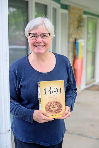 Mike Sudoma/Free Press
Chris Melnick of the Share the Magic charity in front of her home Thursday afternoon
May 30, 2024