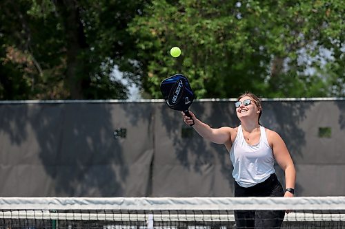 14062023
Danielle Woychyshyn plays pickleball with fellow massage therapy students during an outdoor class at the Stanley Park pickleball courts on Wednesday.
(Tim Smith/The Brandon Sun)