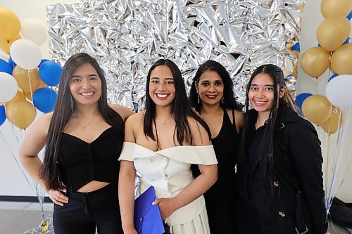 Jessica Acero poses with her family on Thursday afternoon after BU's annual convocation. (Abiola Odutola/The Brandon Sun)