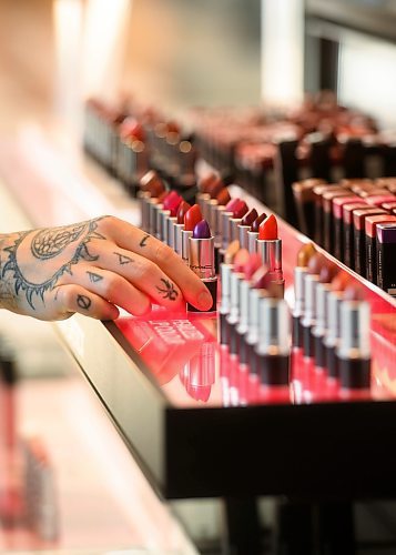 Mike Sudoma/Free Press
A makeup artist reaches for a lipstick off of a dimply case at MAC Cosmetics new store on the 2nd level of Polo Park Shopping Centre Friday morning
May 31, 2024