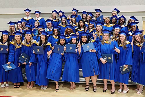 31052024
Graduates ham it up for photos after Brandon University&#x2019;s convocation for the Faculty of Health Studies at the BU Healthy Living Centre on Friday morning. 
(Tim Smith/The Brandon Sun)